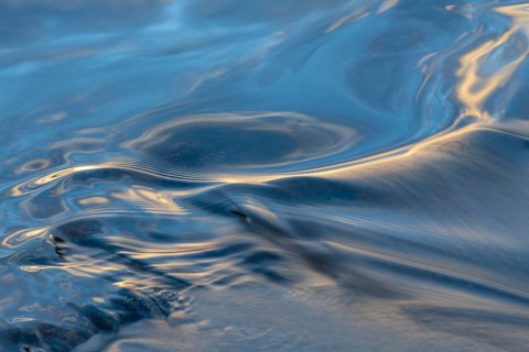 Waves in a stream, abstract, Norrbotten, Lapland, Sweden, August 2022