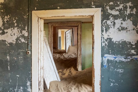 At Kolmanskop, the abandoned ghost town of the diamond days of the early 1900 and of German origin.