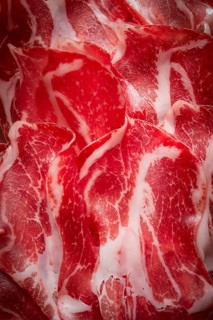 Sliced cured ham, prosciutto, italian dish, delicacy, parma ham, top view, no people
