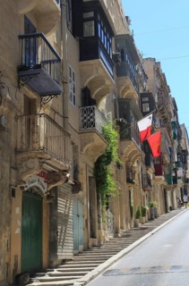 Traditional balconies of historic buildings in city centre, Valletta, Malta