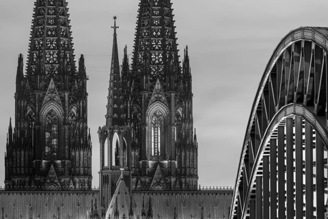 Evening atmosphere, Cologne Cathedral illuminated with LED lamps and the Hohenzollern Bridge,
