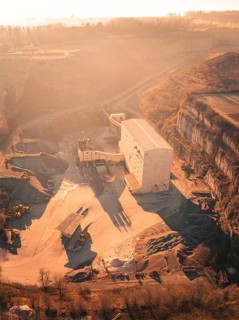 Industrial quarry with machines in the early morning, Magstadt, Germany