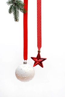 Christmas baubles and star on a red ribbon, Christmas decorations