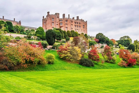 Autumn colors over Powis Castle and Garden, Welshpool, Powys, Wales, UK