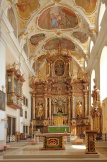 Magnificent baroque basilica with frescoes, pulpit and decorations, chancel, interior view,