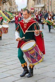 Participants wearing historical costumes on parade, Noto, Noto Valley, Sicily, Italy