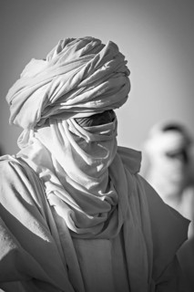 Black and white portrait of a man with a turban in traditional clothing, The traditional Tuareg at