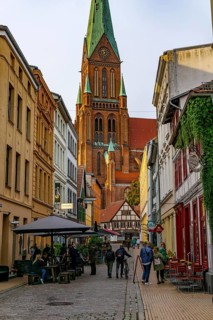 The historic old town of Schwerin, Buschstraße, alley with many restaurants, St.-Marien-Dom zu
