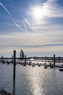 The East Frisian North Sea island of Juist in winter, empty sports harbour, lookout tower