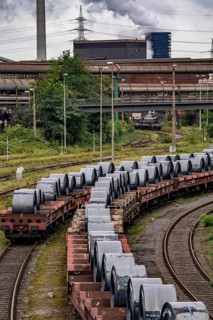 Strip steel coils, on freight wagons, at the ThyssenKrupp Steel plant Schwelgern in