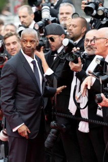 Cannes, France - 19.5.2024: Denzel Washington next to photographers during the - Highest 2 Lowest -