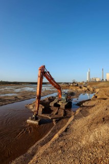 Dinslaken, North Rhine-Westphalia, Germany, New Emscher estuary into the Rhine. Excavator in the