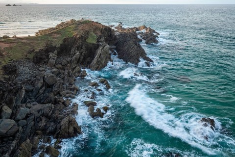 Sunset with wide view over the east coast at Cape Byron, New South Wales, Australia