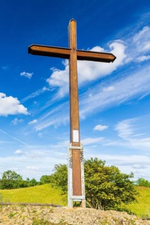 Summit cross in front of a blue sky, Rodenstein on the Ehrenbürg, Franconian Alb, Bavaria, Germany