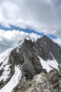 Rocky mountain ridge and glaciated mountain peak Großer Möseler, glacier Furtschaglkees, Berliner