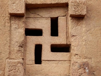 A stone window pattern, swastika, UNESCO World Heritage Site, Lalibela rock church, Ethiopia