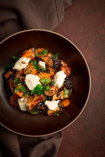 Warm Salad with crispy eggplant and tomatoes, cottage cheese, spices, herbs, sesame seeds,