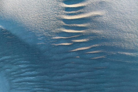 Rippling sand textures in La Puna desert capture the essence of nature's artistry. Soft light and