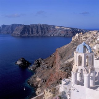 Partially rebuilt village of Oia, partially destroyed houses, remains of the 1956 earthquake in