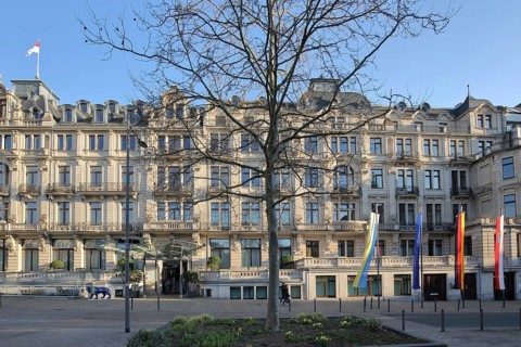 State Chancellery with EU flag, German national flag, Hessian state flag and Ukrainian national