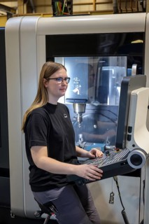Oberhausen, North Rhine-Westphalia, Germany, Trainee woman in metalworking. Trainee cutting machine