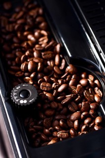 Coffee machine, coffee bean container, top view, close-up, no people, rustic style, selective focus
