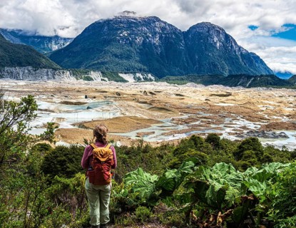 Hiking woman, glacier tongue, glacier Exploradores, Valle Exploradores, near Puerto Rio Tranquilo,