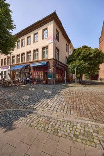 Corner building with the Pinocchio pizzeria on Ratinger Straße in the historic centre of