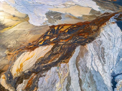 From above, this aerial drone image captures the stunning interplay of abstract nature textures,