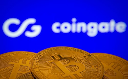Dhaka, Bangladesh- 03 Sep 2025: Close-up of Bitcoin coins with the Coingate logo visible on a