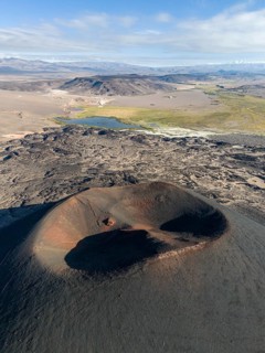 Detailed aerial view of a volcanic crater with its deep structures and volcanic ash, Argentina,