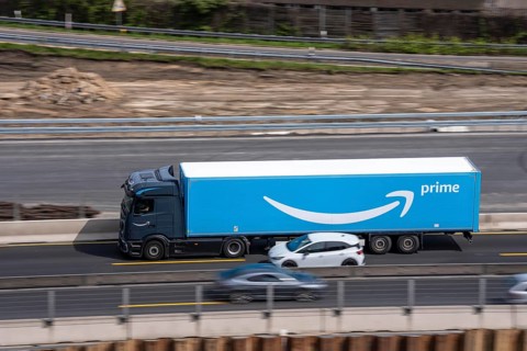 Freight truck from the online department store Amazon Prime, on the highway