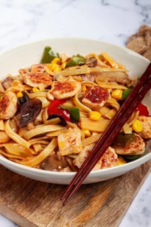 Fried noodles with chicken meat and vegetables, Bami Goreng, Indonesian dish, no people