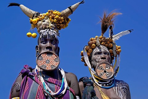 Ethiopia, Mursi woman, lip plates, plate lips, dhebi, body painting, decorative scars, two people,