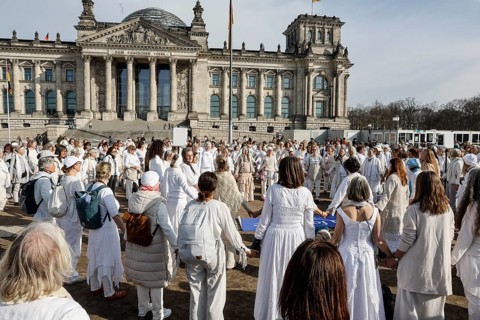 Women in white, woman dare peace, demonstrate on International Women's Day for Peace at the