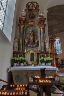 Altar of the Virgin Mary with sacrificial candles, St. Verena Parish Church, Fischen, Allgäu,