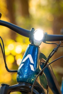 Close-up of a bicycle with front light switched on in the forest, e-bike, forest bike, Calw,