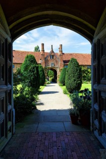 View through an archway, Sissinghurst Castle and Garden, Cranbrook, Kent, England, Great Britain
