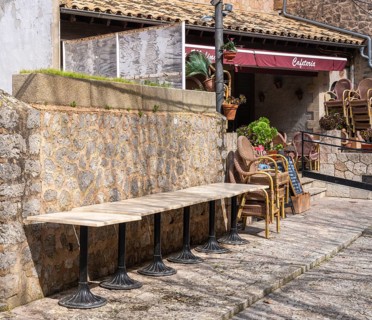 Small alleys with cafes, restaurants and fashion stores in the picturesque mountain village of