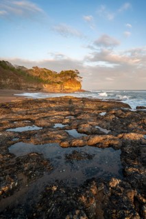 Rocks on the beach, Playa Cocalito, coastal landscape at sunset, Pacific coast, Nicoya Peninsula,