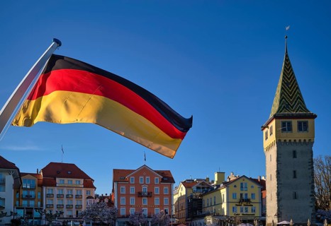 German flag, German flag, flying on ferry, behind Mangturm, promenade, Lindau, Bavaria, Lake