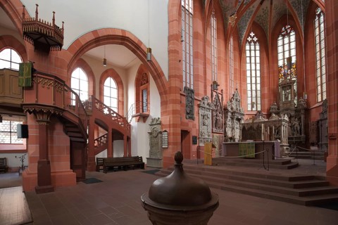 Altar room of the late Gothic collegiate church with pulpit and baptismal font, Wertheim,