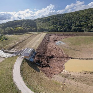 Blockages caused by wood at the Fahrafeld flood defence after a severe storm, Pottenstein, Lower