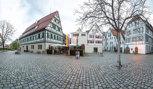 April 19, 2026: Panoramic view of Schlossplatz with Kirchheim Castle and Old Forestry House at