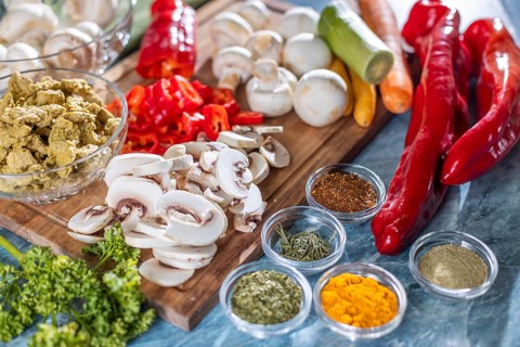 Fresh ingredients such as peppers, carrots and mushrooms in addition to spices and herbs