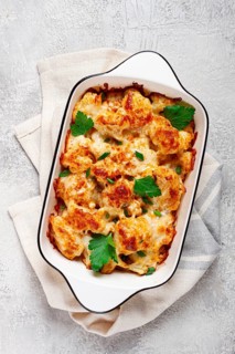 Baked cauliflower, in cream sauce, with cheese and spices, homemade, no people