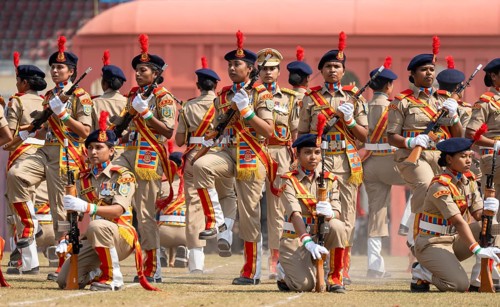 Women personnel of the Central Reserve Police Force (CRPF) perform a synchronised rifle drill