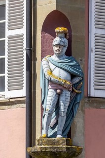 Town view of Schwäbisch Hall. Knight figure with genital protection on a building facade.