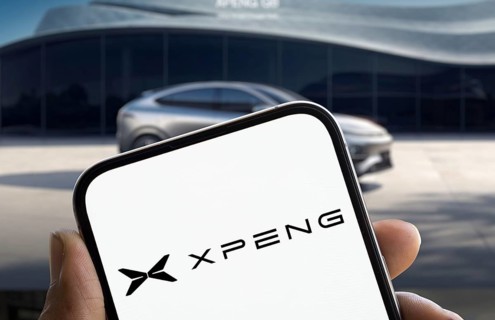 Xpeng logo is displayed on smartphone. Guangzhou Xiaopeng Motors Technology Co Ltd is a Chinese
