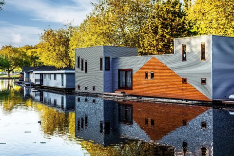 Floating houses, walking along the Rotte, route from the modern city center to the green suburbs